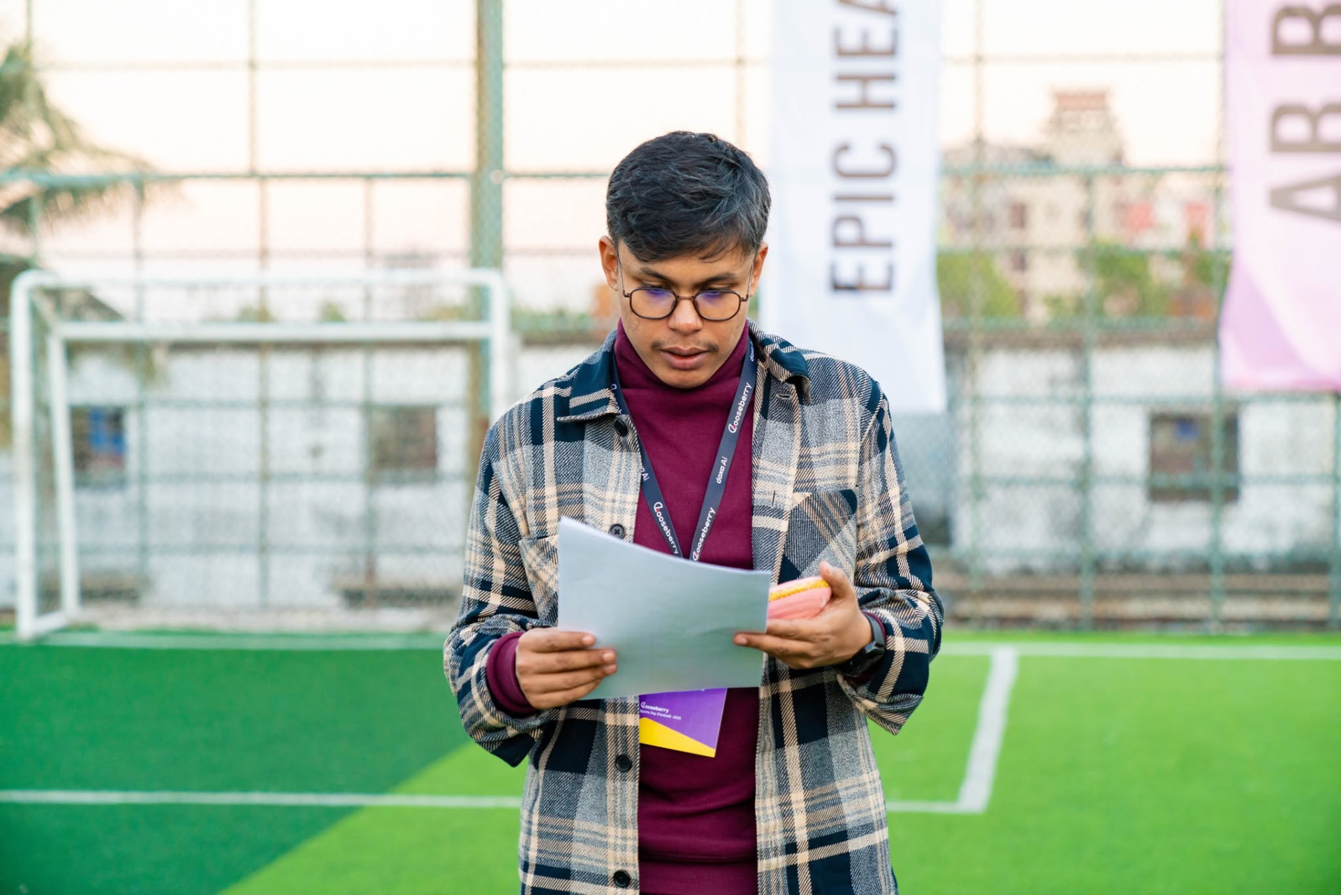 Gooseberry team member reviewing notes at a company event